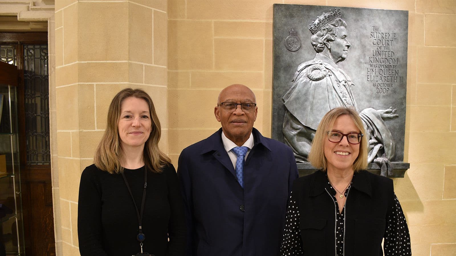 Sir Anthony Smellie is welcomed to the JCPC by (L) Registrar Celia Cave and (R) Chief Executive Vicky Fox